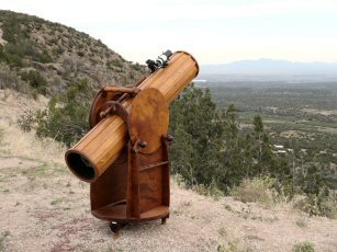 Wooden Telescope Overlooking Mountains